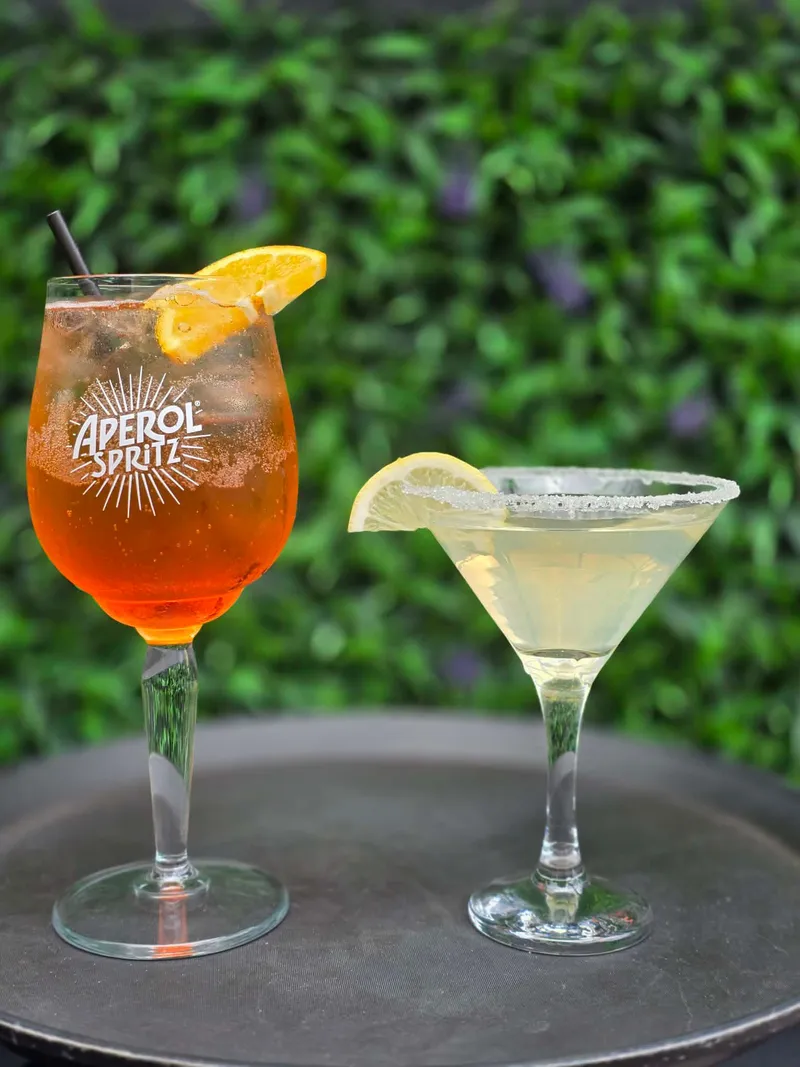 Signature Aperol Spritz and Bees Knees cocktails at Bar Thirty Five Bude, £9.50 each